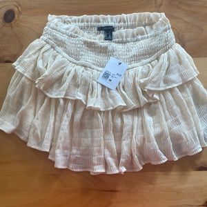 Forever 21 cream short skirt.  Medium
